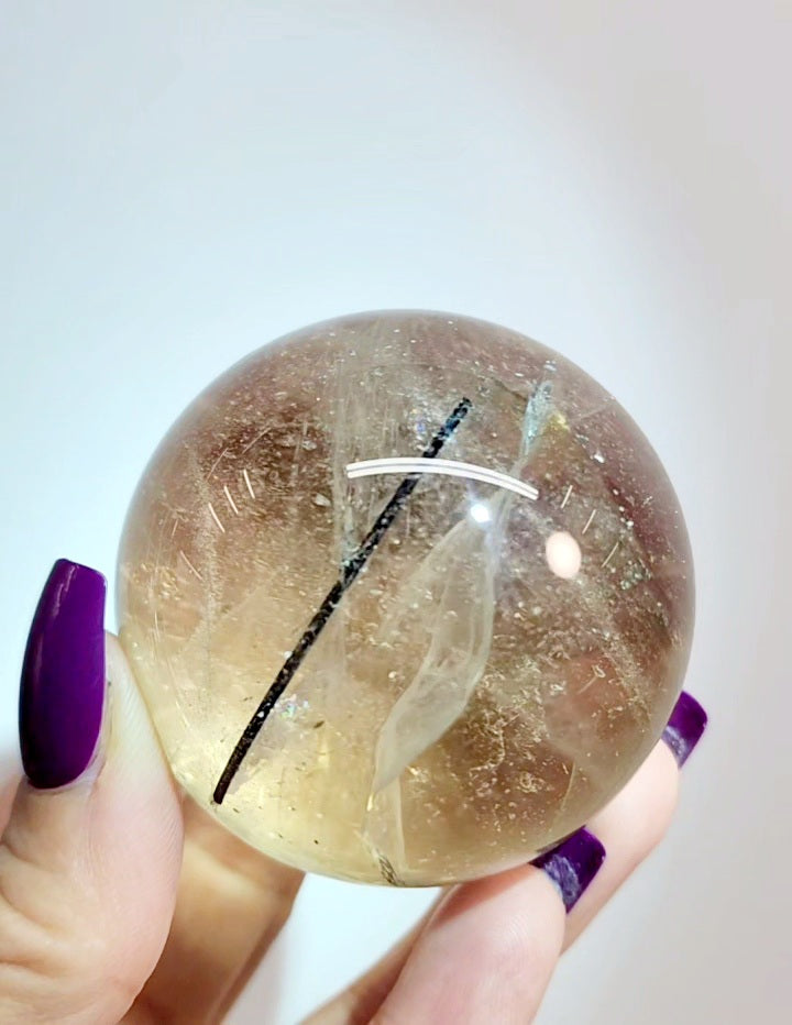 Clear Smoky Citrine Sphere with Black Tourmaline/ Rutile and White Phantom