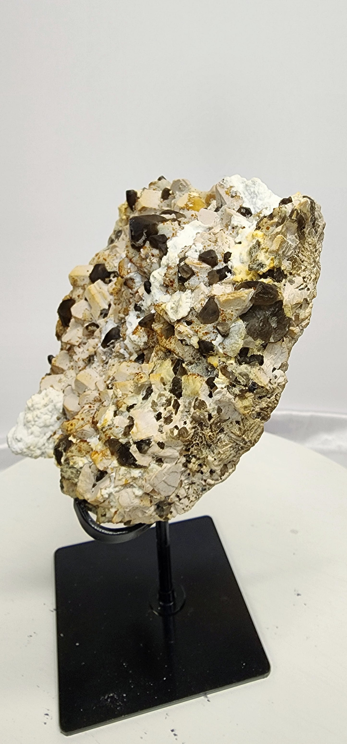 Large Amber Calcite W/ Smoky Inclusion and Aroganite on Metal Stand UV over 3.5lbs