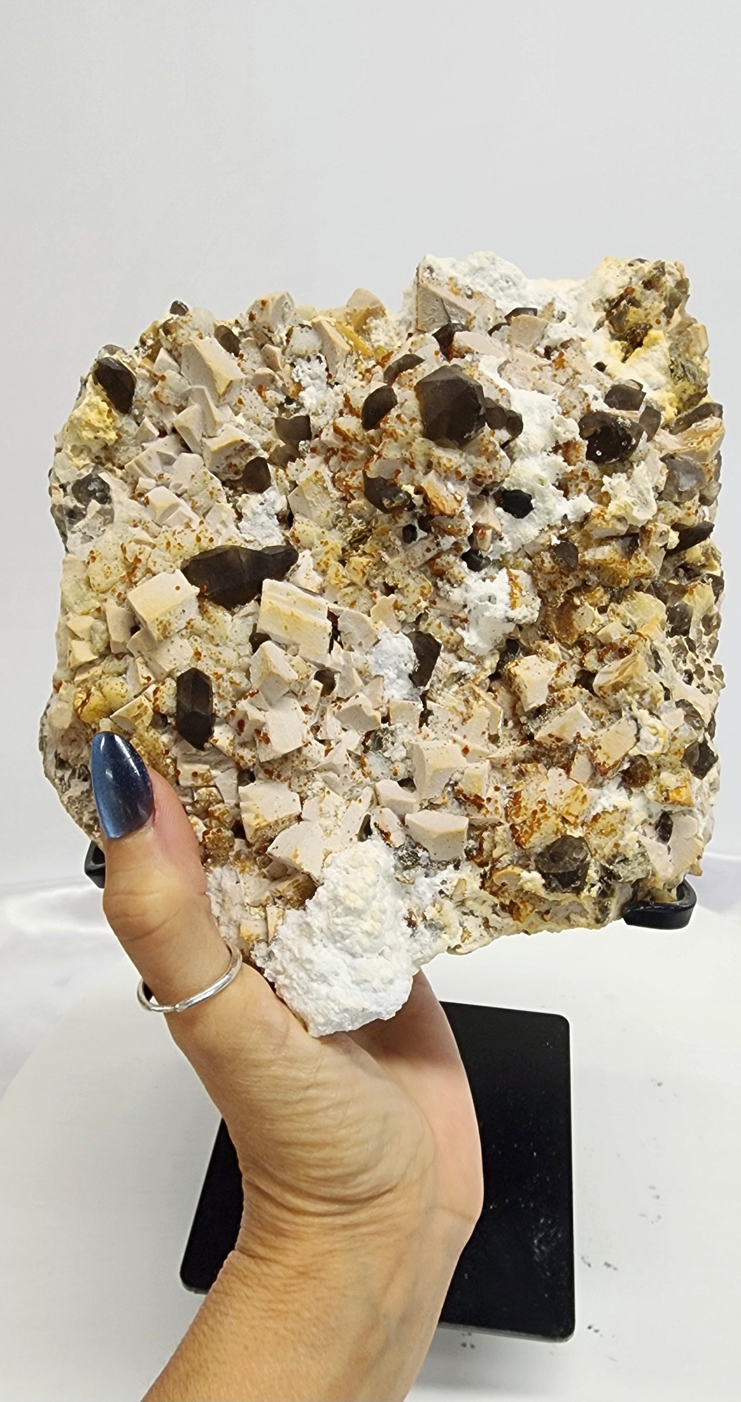 Large Amber Calcite W/ Smoky Inclusion and Aroganite on Metal Stand UV over 3.5lbs