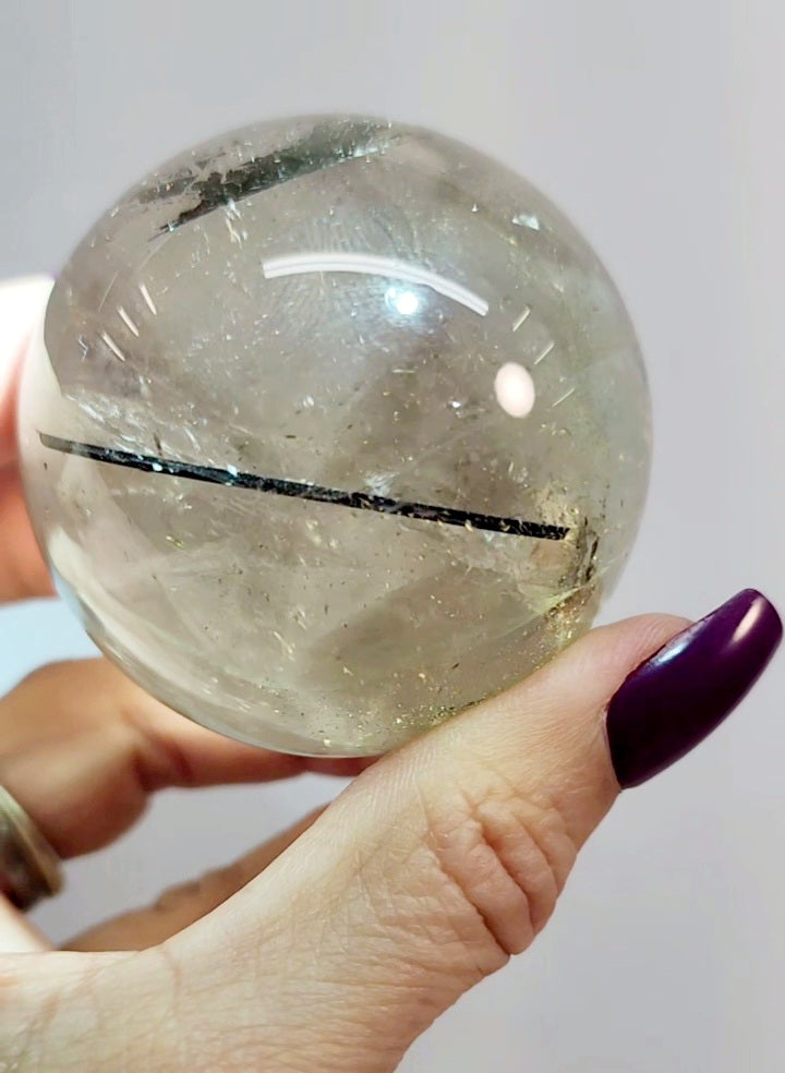 Clear Smoky Citrine Sphere with Black Tourmaline/ Rutile and White Phantom