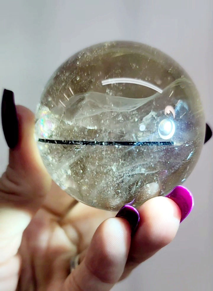 Clear Smoky Citrine Sphere with Black Tourmaline/ Rutile and White Phantom