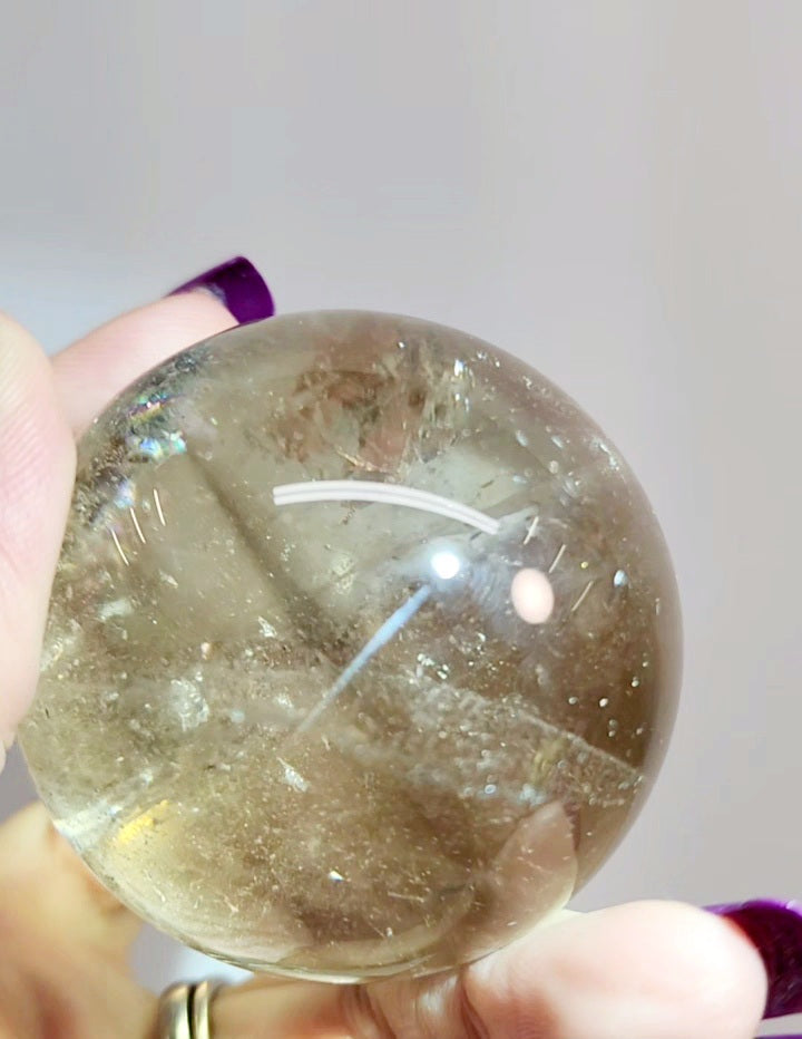 Clear Smoky Citrine Sphere with Black Tourmaline/ Rutile and White Phantom
